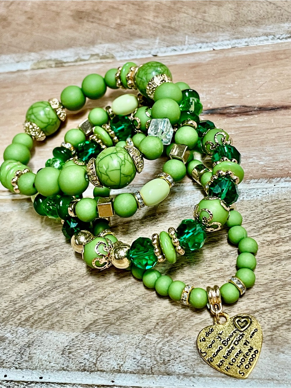 Green Beaded Stretch Bracelet Stack with Gold Accents and Heart Charm